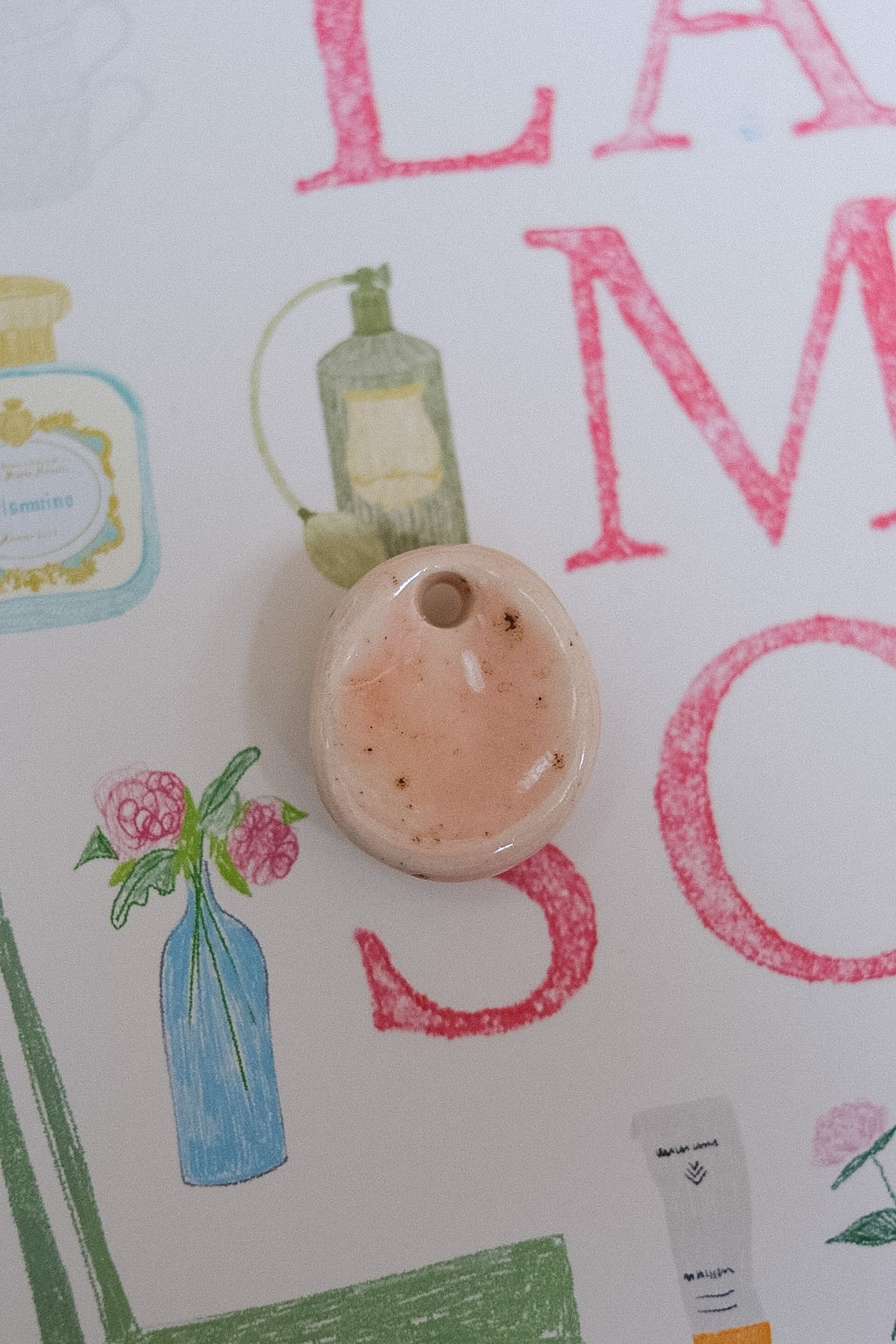 Pendentif pierre d’apaisement en céramique
