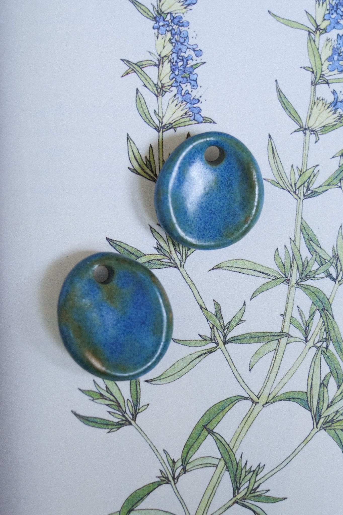 Pendentif pierre d’apaisement en céramique