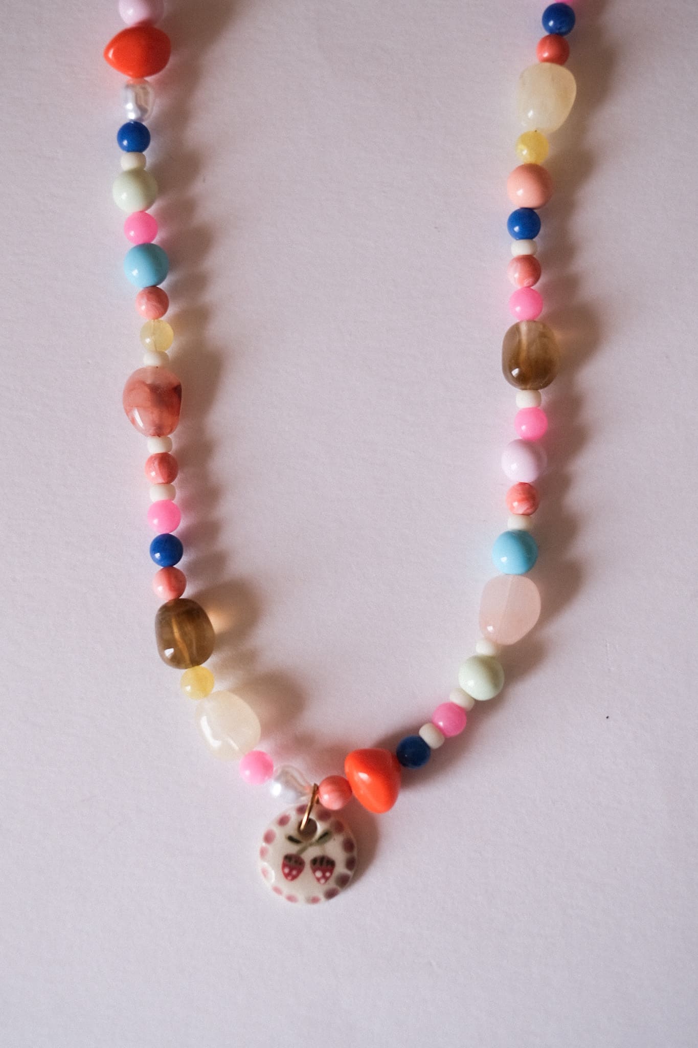 Collier unique en acier inoxydable, médaille céramique