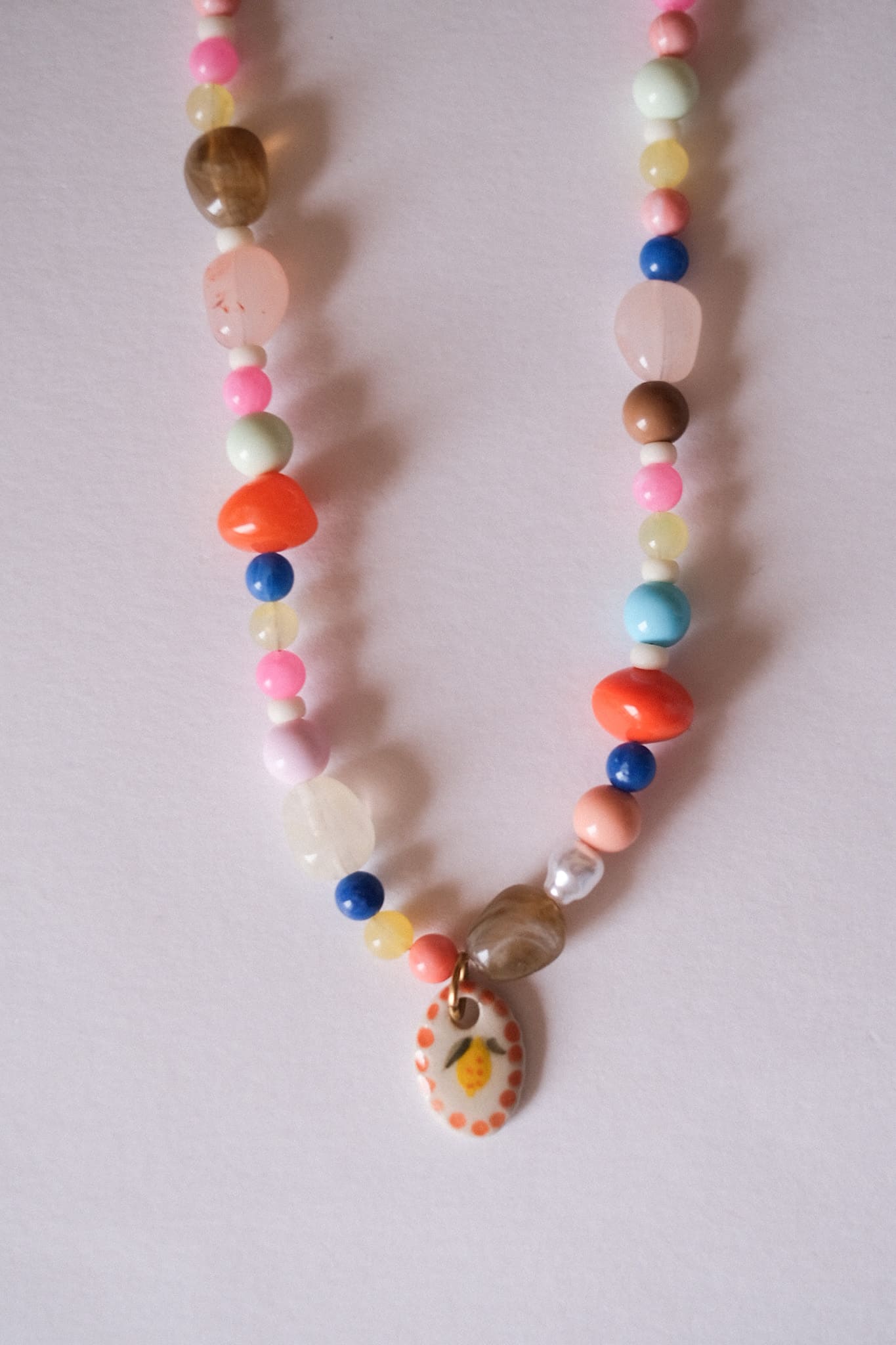 Collier unique en acier inoxydable, médaille céramique