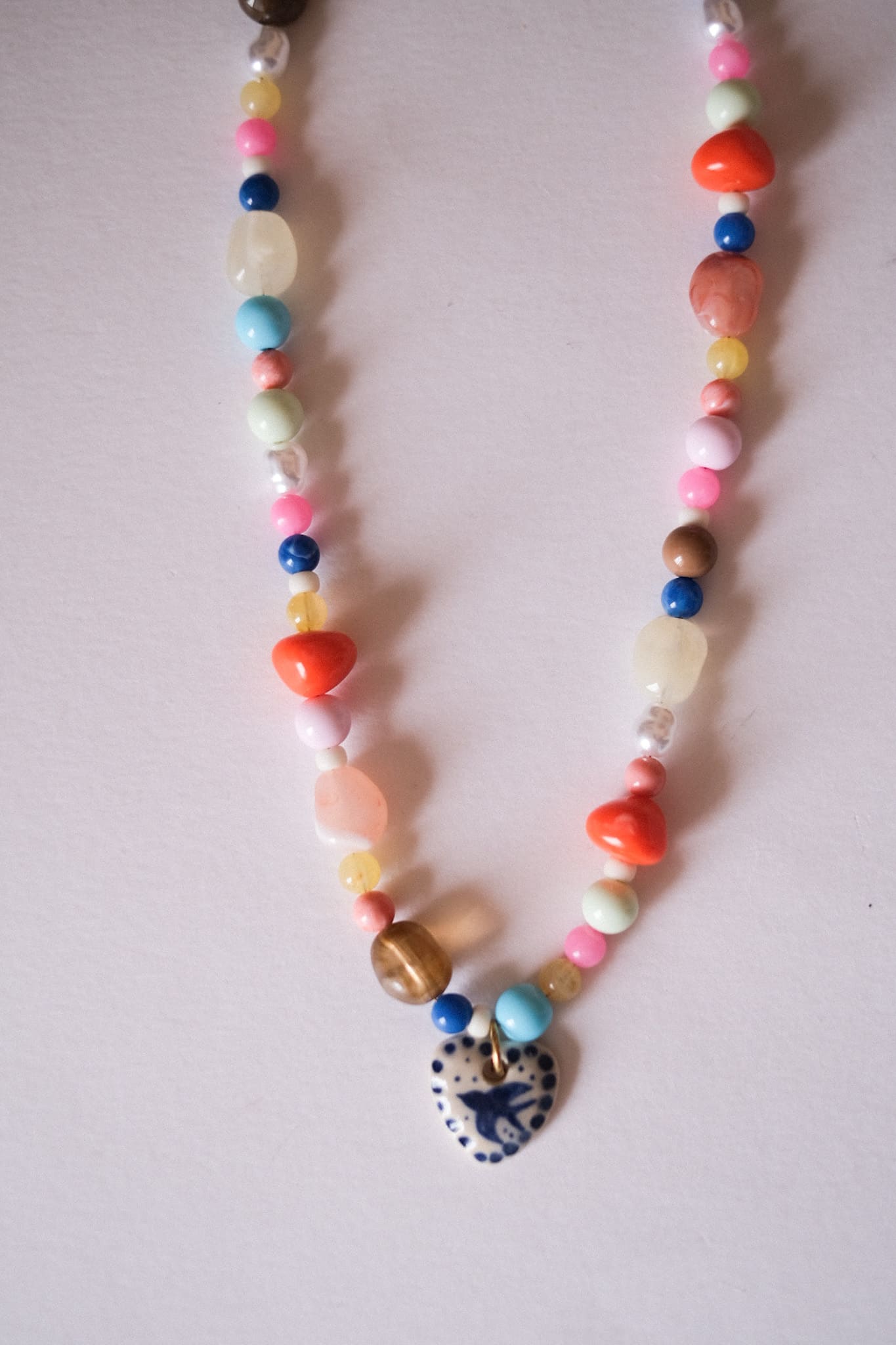 Collier unique en acier inoxydable, médaille céramique