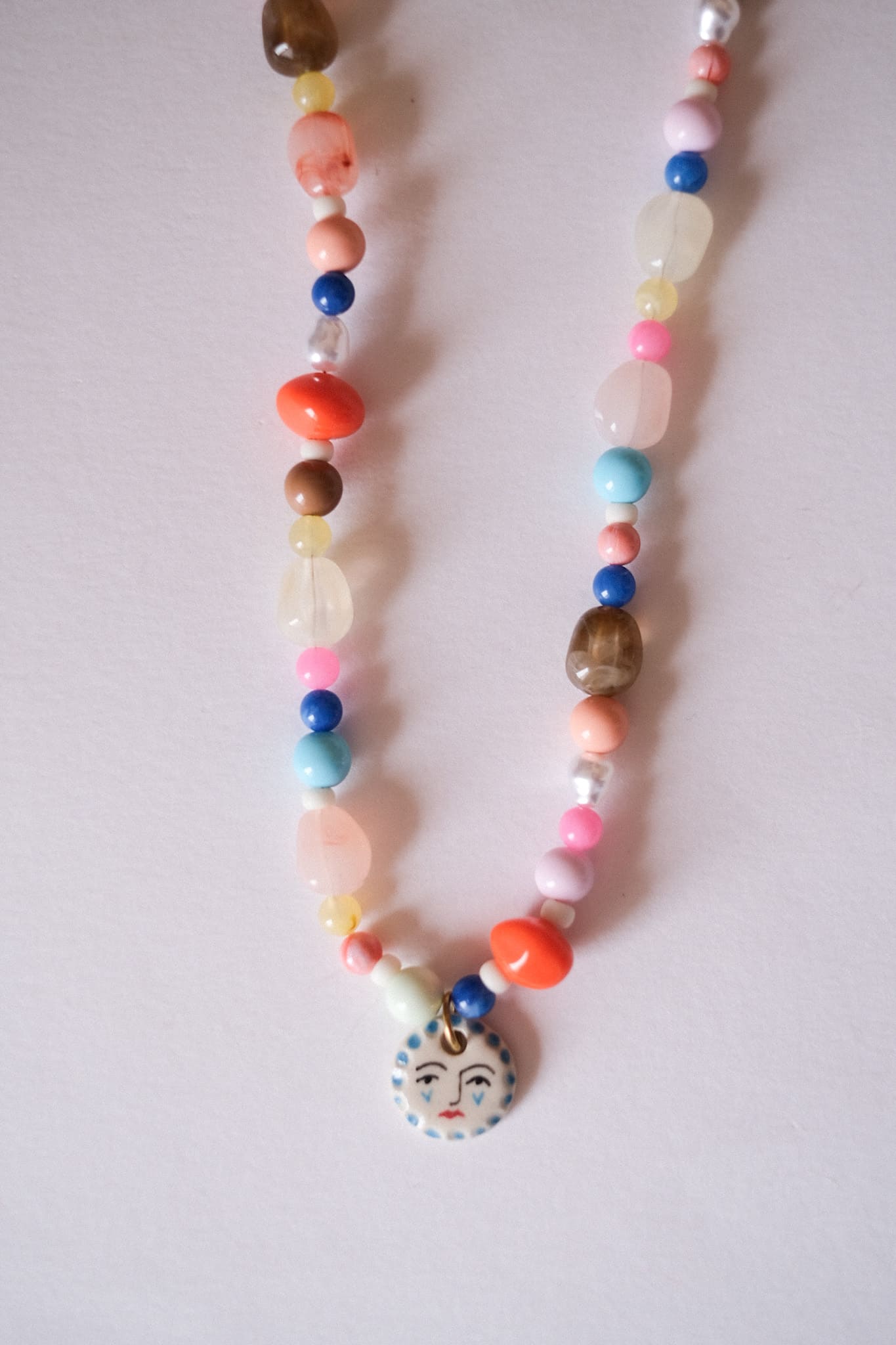 Collier unique en acier inoxydable, médaille céramique