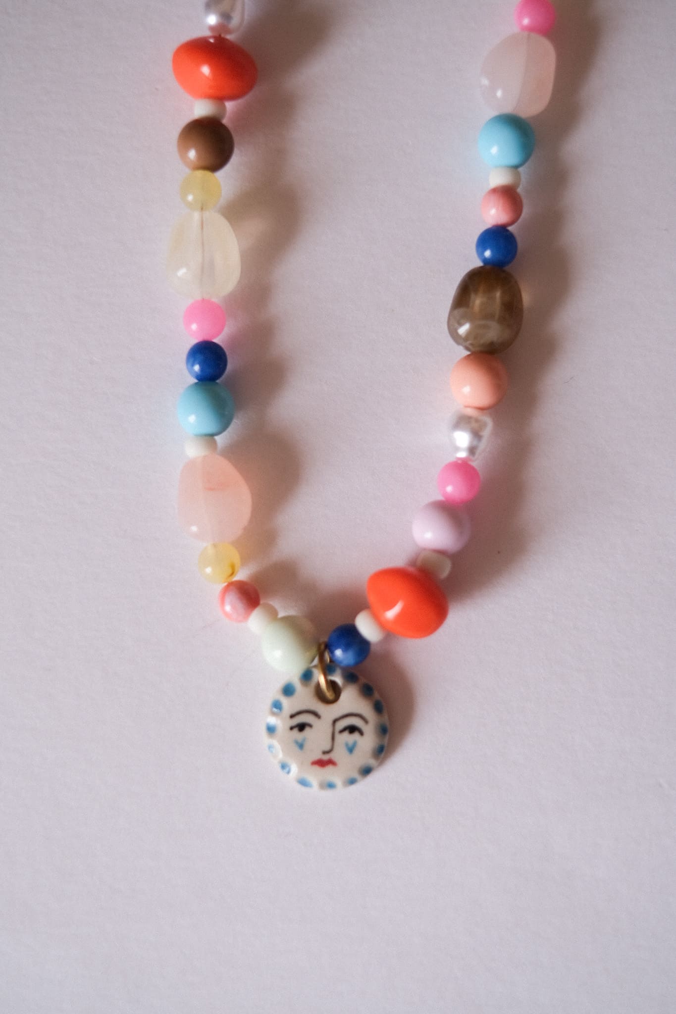 Collier unique en acier inoxydable, médaille céramique