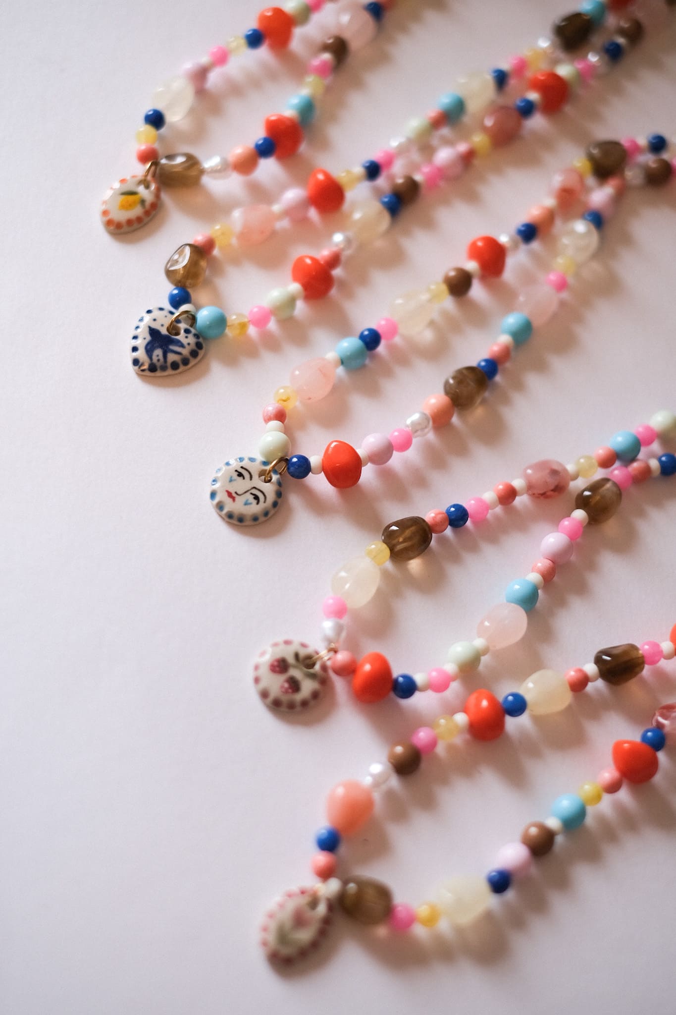 Collier unique en acier inoxydable, médaille céramique