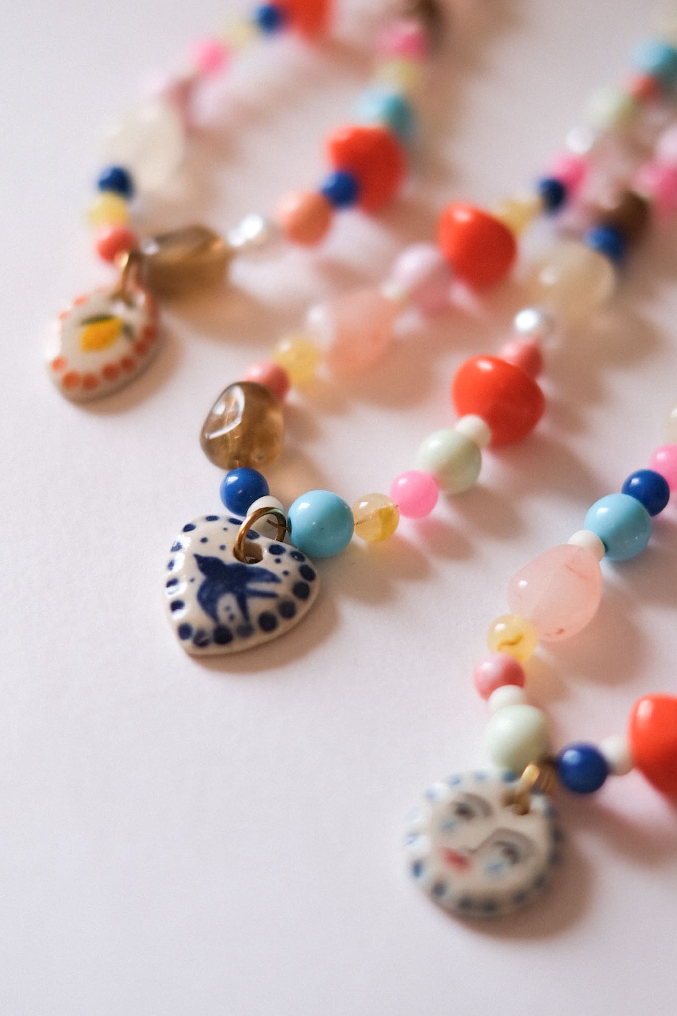 Collier unique en acier inoxydable, médaille céramique