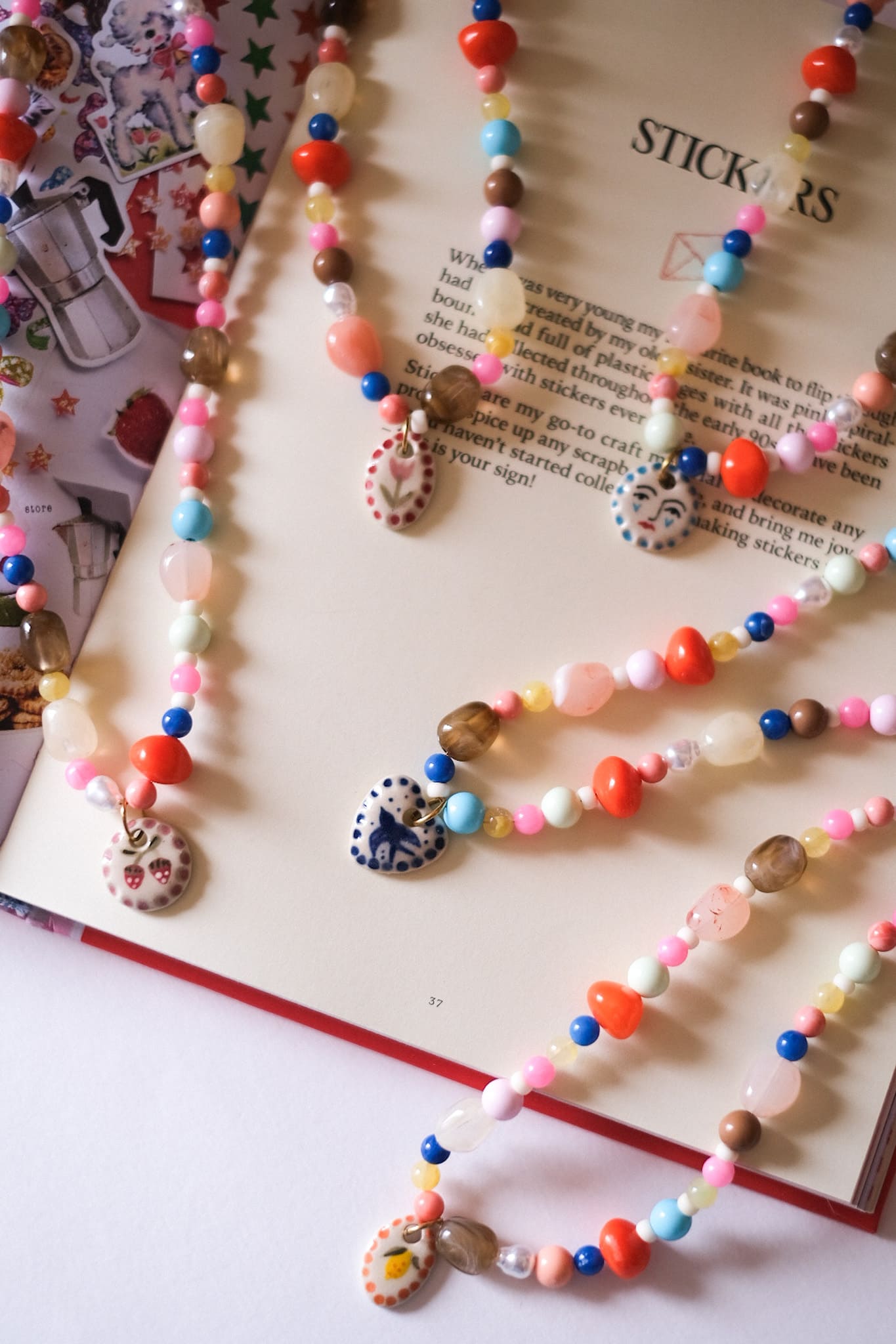 Collier unique en acier inoxydable, médaille céramique