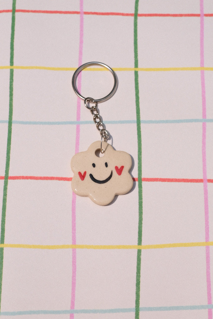 Porte clés gri-gri fleur – sourire et joues en cœur