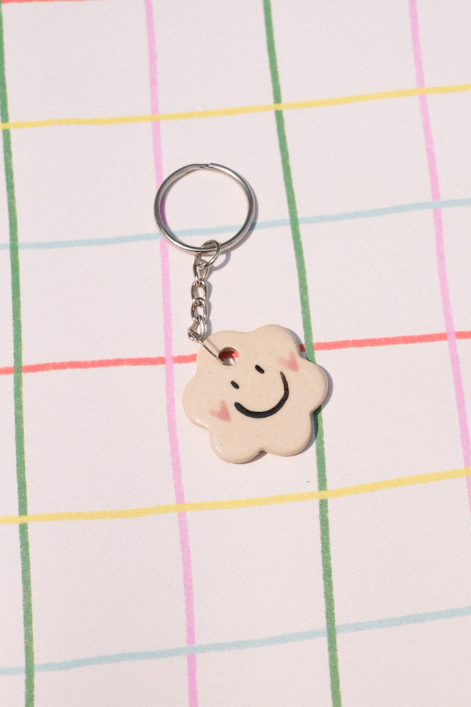 Porte clés gri-gri fleur – sourire et joues en cœur